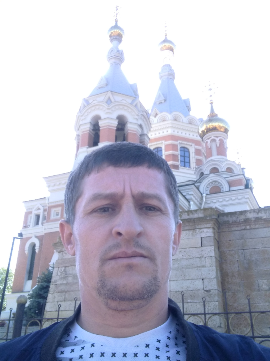 Николай